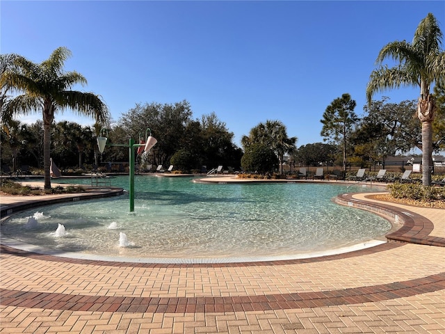 view of pool featuring pool water feature