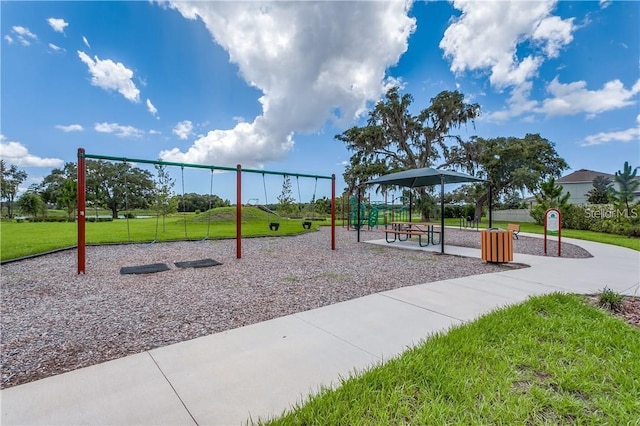 view of jungle gym with a lawn