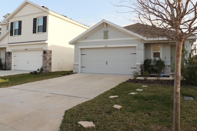 view of front facade with a garage and a front yard