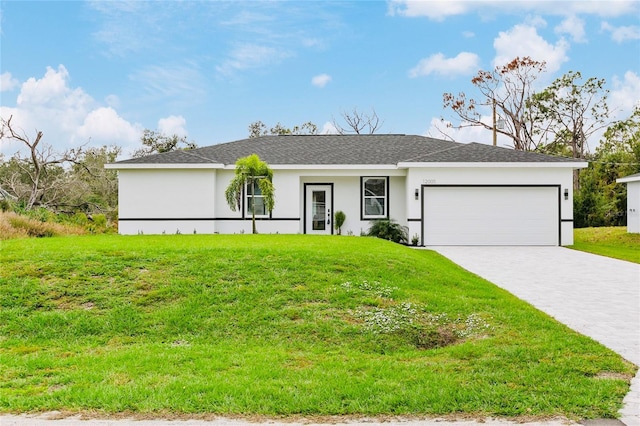 ranch-style home with a garage and a front yard