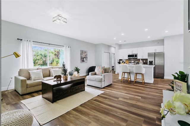 living room with dark wood-type flooring