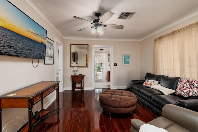 living room with ceiling fan, crown molding, and dark hardwood / wood-style floors