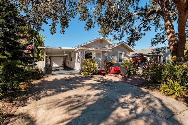 view of front of home with a carport