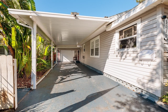 view of patio / terrace with a carport