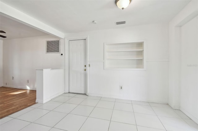 view of tiled spare room