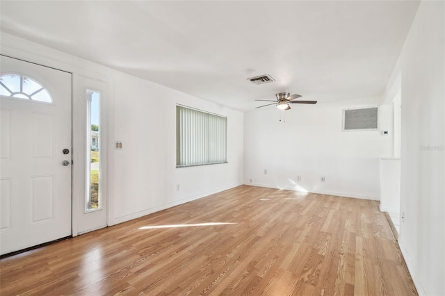 entrance foyer featuring light hardwood / wood-style flooring and ceiling fan