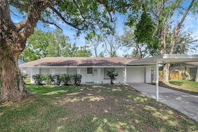 ranch-style home featuring a carport and a front yard