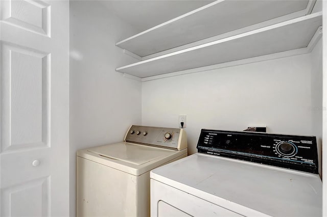 laundry area featuring separate washer and dryer