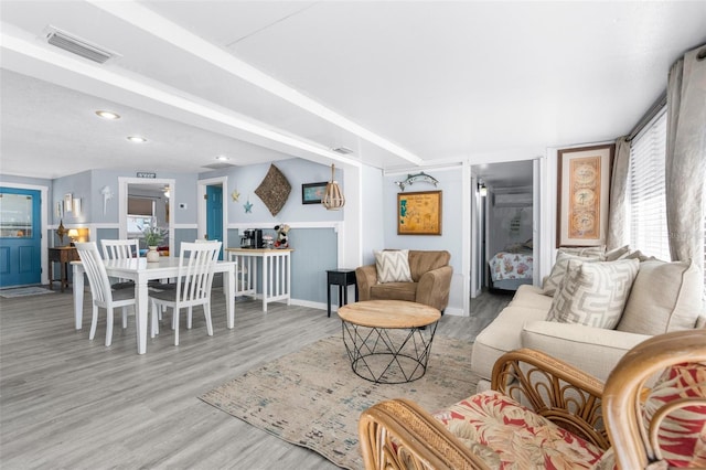 living room with wood-type flooring