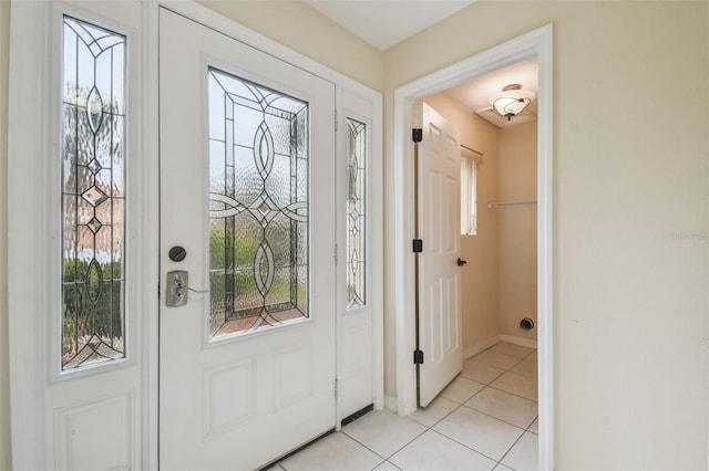 entryway featuring light tile patterned flooring