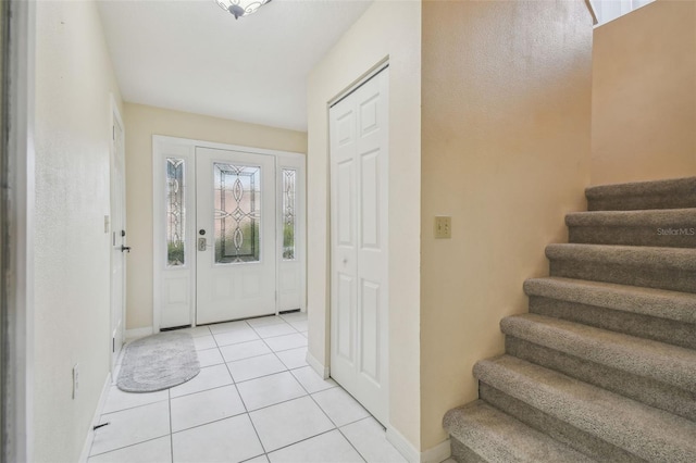 view of tiled foyer entrance