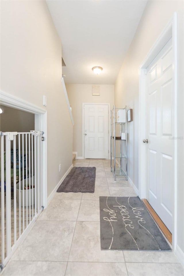 view of tiled foyer entrance