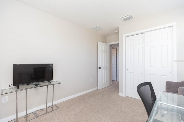 home office featuring light colored carpet