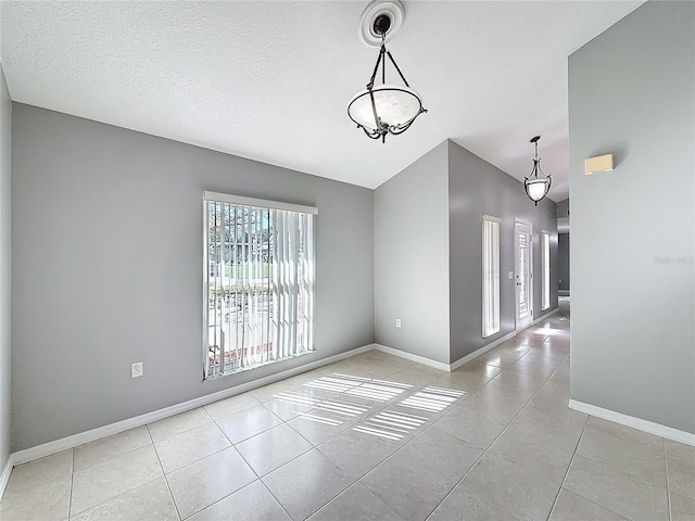 unfurnished dining area with light tile patterned floors