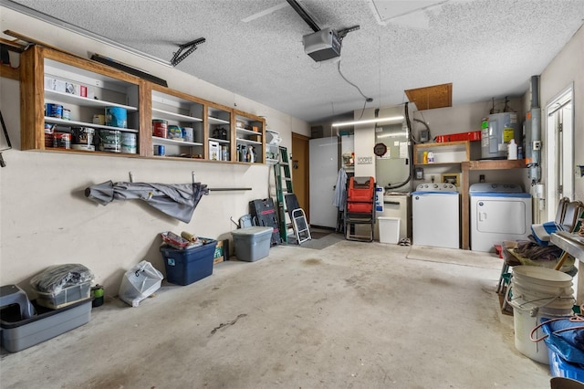 garage with washer and clothes dryer, water heater, and a garage door opener