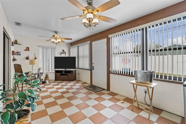 living room featuring ceiling fan