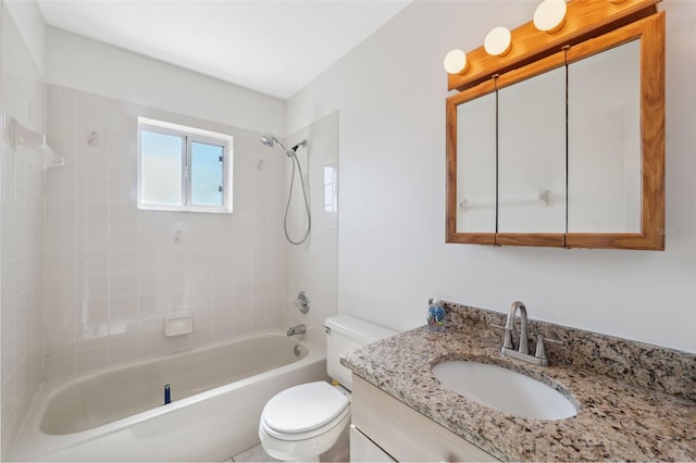 full bathroom with toilet, tiled shower / bath combo, and vanity