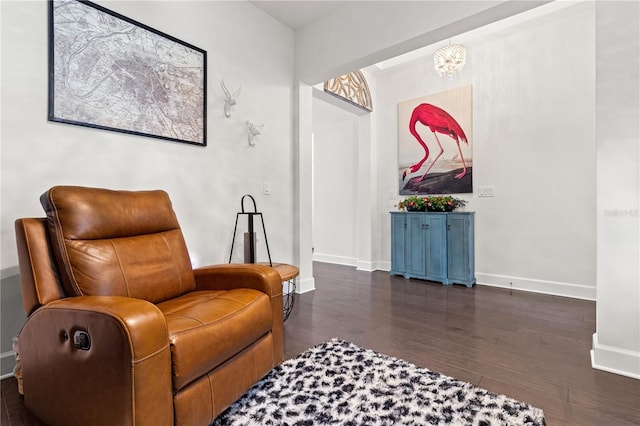 sitting room with dark hardwood / wood-style floors