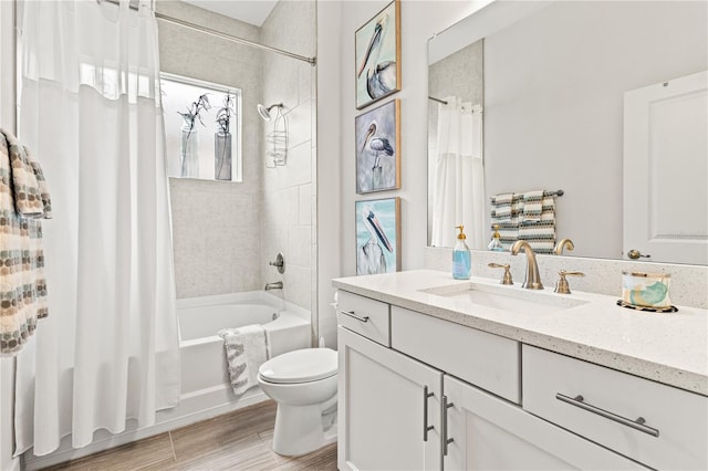 full bathroom with toilet, vanity, wood-type flooring, and shower / bathtub combination with curtain