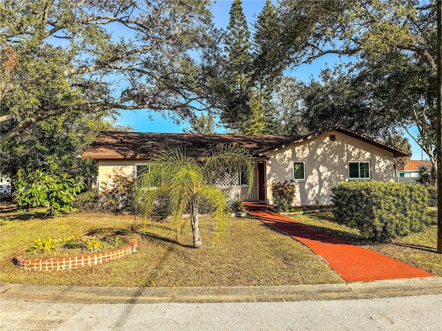 view of front of home with a front lawn