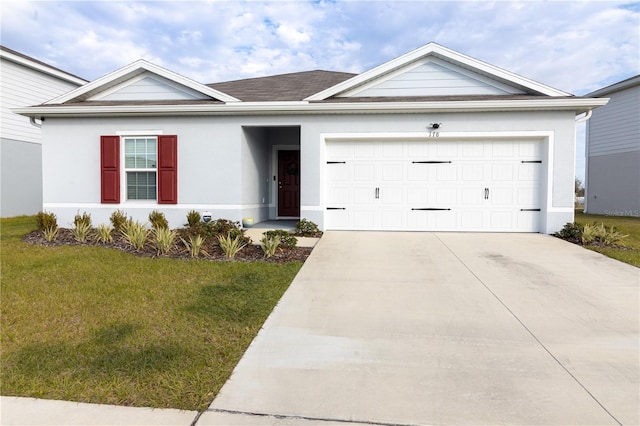 ranch-style home with a front yard and a garage