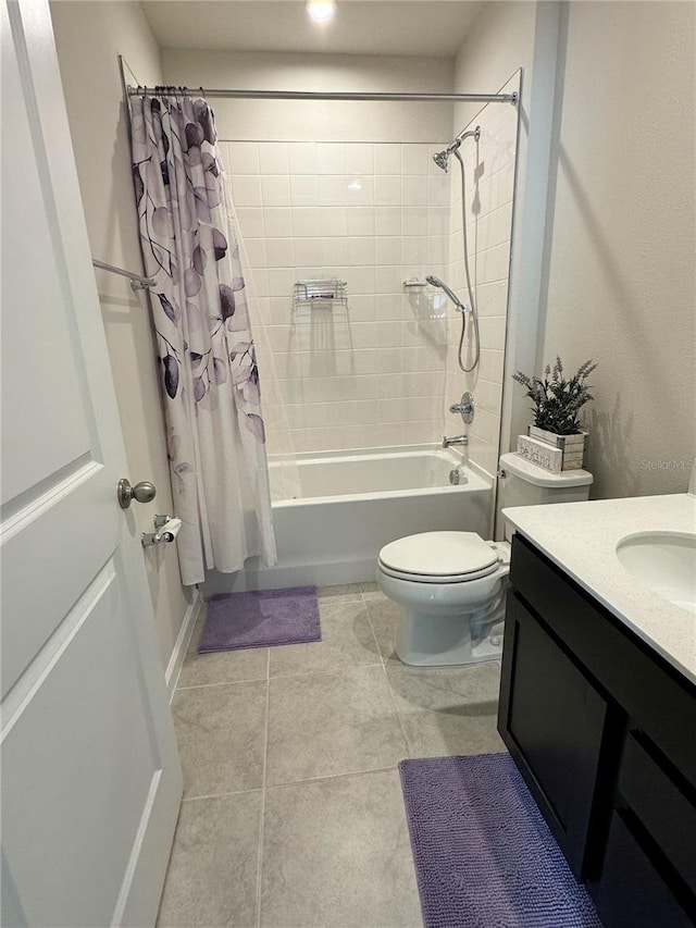 full bathroom featuring toilet, tile patterned floors, shower / bath combo, and vanity