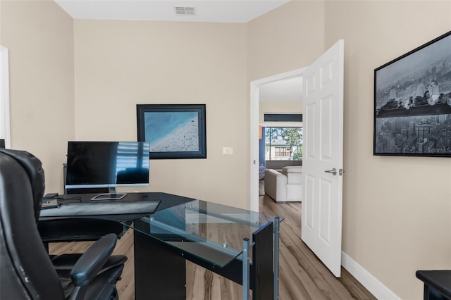 office space featuring wood-type flooring