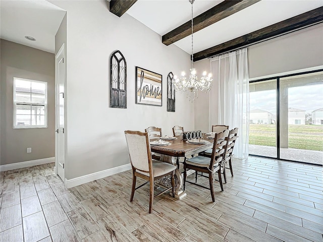 dining area with a chandelier and beamed ceiling