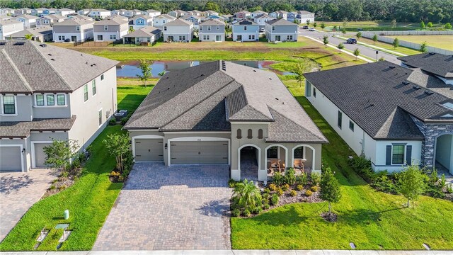 13028 Homestead Ln, Parrish, FL 34219 - aerial view of residential area with a large body of water