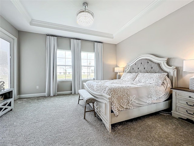 13028 Homestead Ln, Parrish, FL 34219 - carpeted bedroom featuring a tray ceiling, crown molding, and baseboards