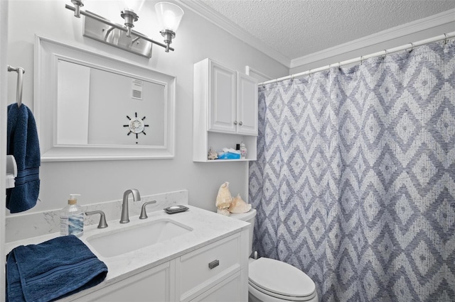 bathroom featuring vanity, toilet, ornamental molding, and a textured ceiling