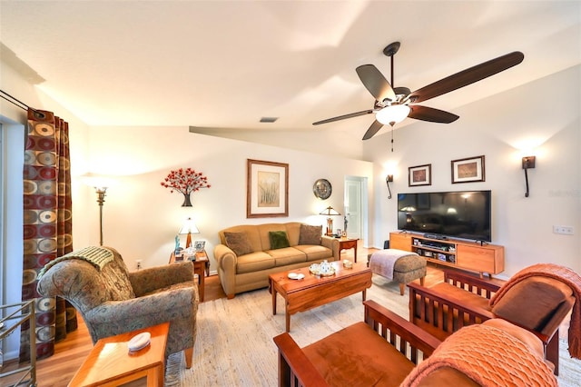 living room with visible vents, light wood-style flooring, ceiling fan, and vaulted ceiling