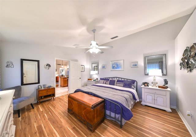 bedroom featuring a ceiling fan, light wood-style flooring, baseboards, and visible vents