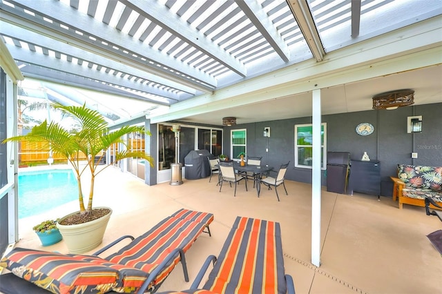 view of patio / terrace featuring area for grilling, outdoor dining space, and a pergola