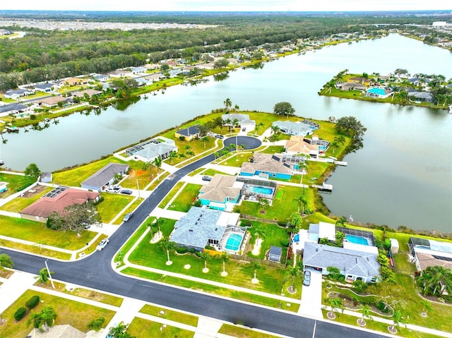 birds eye view of property featuring a residential view and a water view