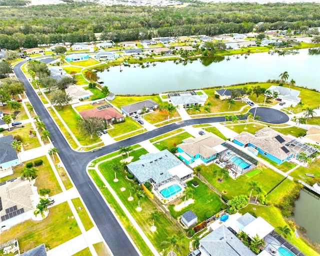 bird's eye view with a water view and a residential view