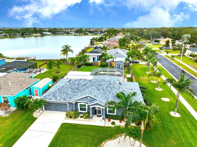 birds eye view of property featuring a water view