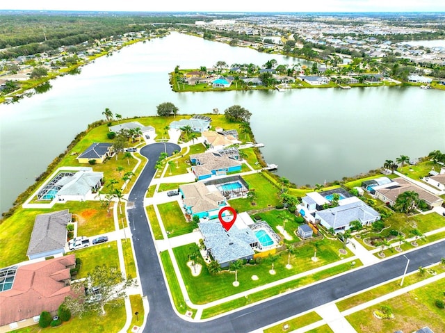 aerial view featuring a water view and a residential view