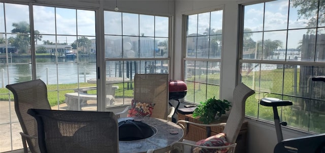 sunroom with a water view