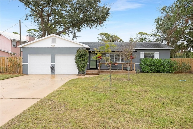 ranch-style home with a front yard and a garage