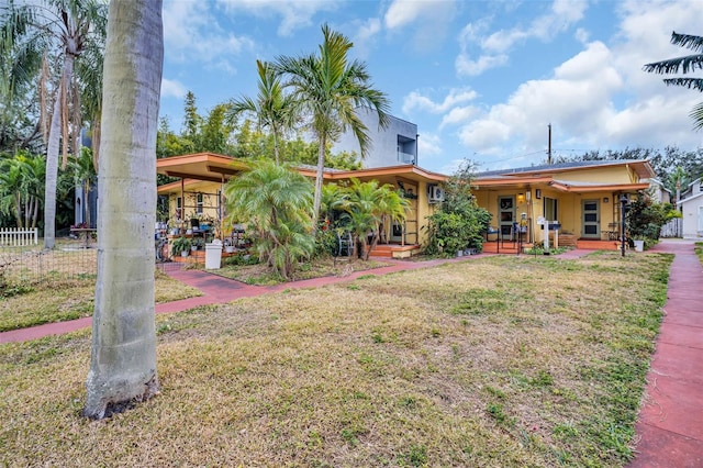 view of yard with covered porch