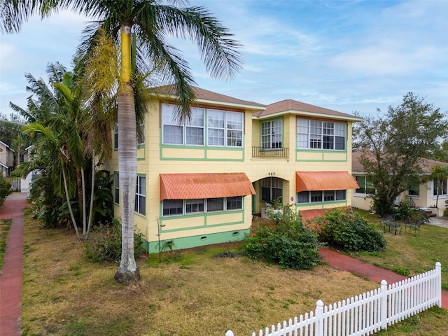 view of front of home with a front yard