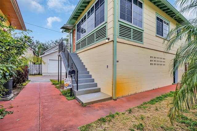 view of property exterior featuring a garage