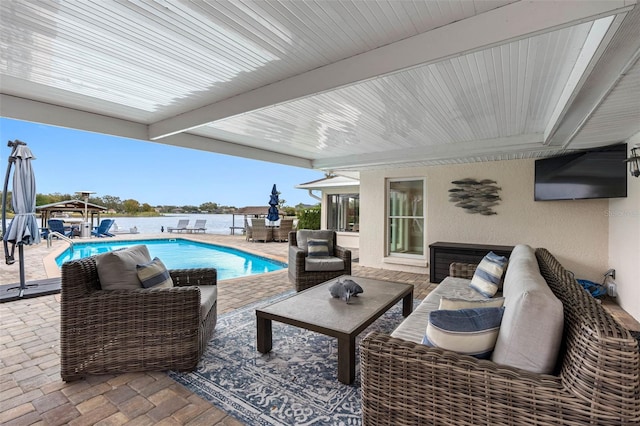 view of swimming pool featuring a gazebo, a patio, and outdoor lounge area