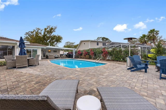 view of pool with a patio area