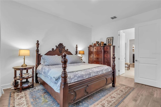 bedroom with light wood-type flooring