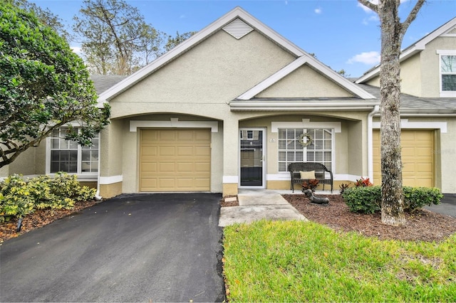 view of front of property with a garage