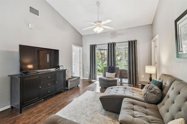 living room featuring high vaulted ceiling, dark wood-type flooring, and ceiling fan