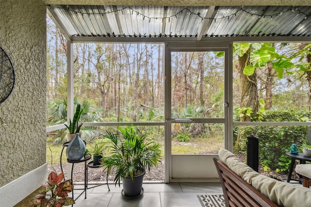 sunroom / solarium featuring a wealth of natural light