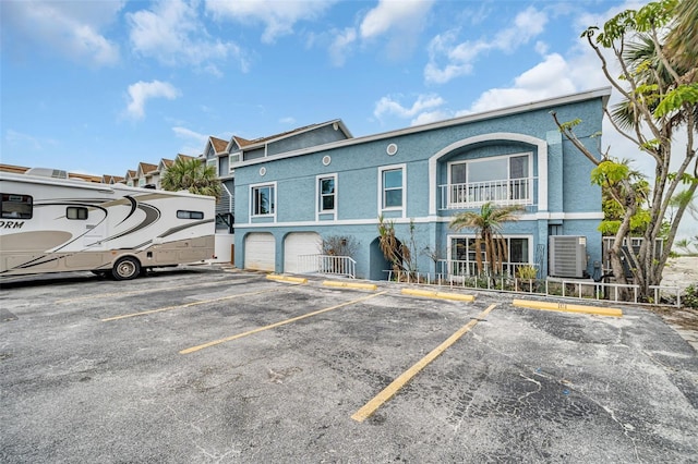 view of parking featuring a garage